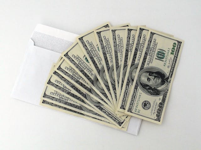 A stack of $100 bills. 